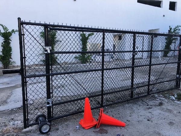 Chain Link Fence 30 - For a free estimate call 561.318.4788